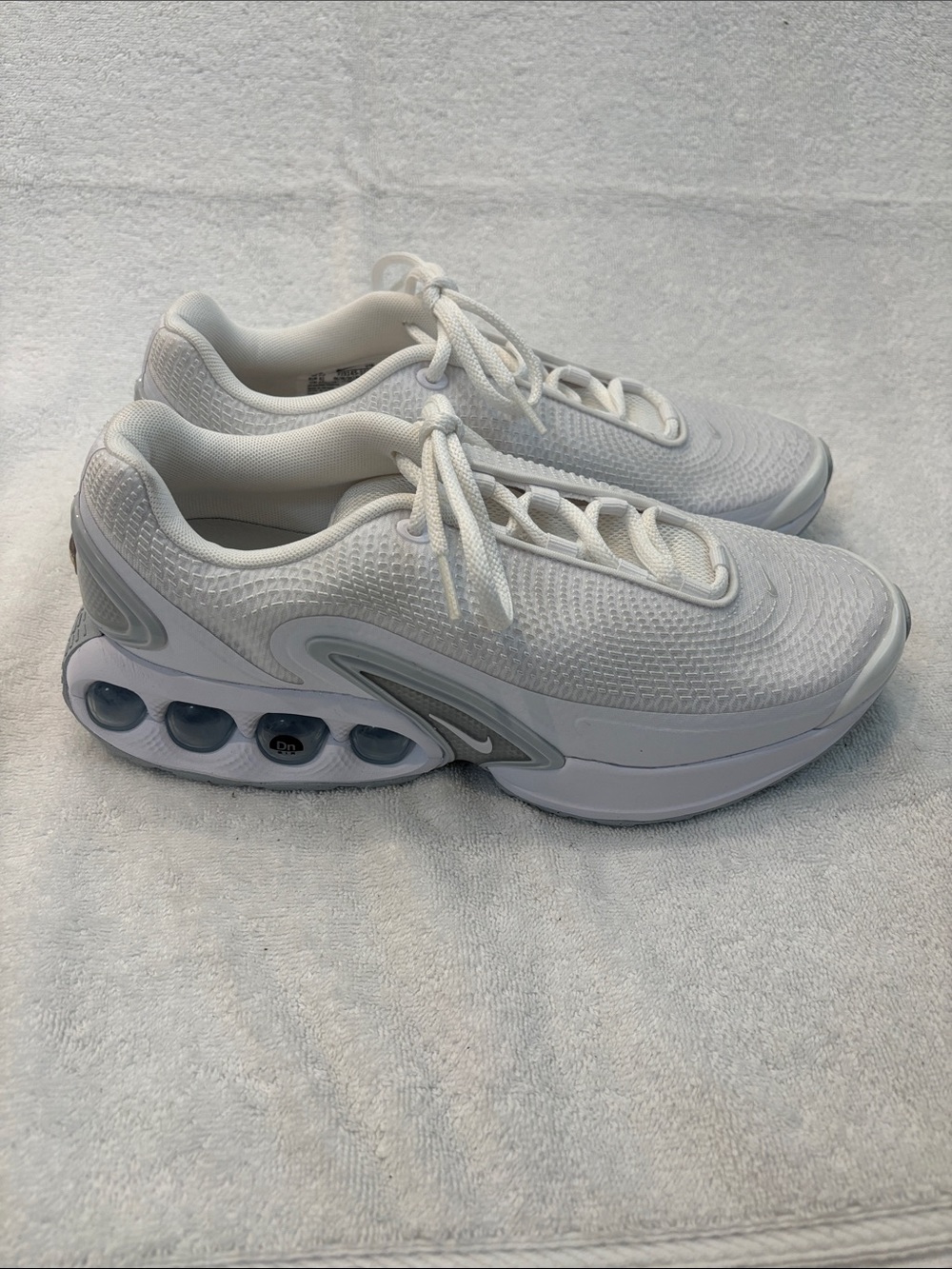Nike Women's White Mesh Sneakers with Silver Accents